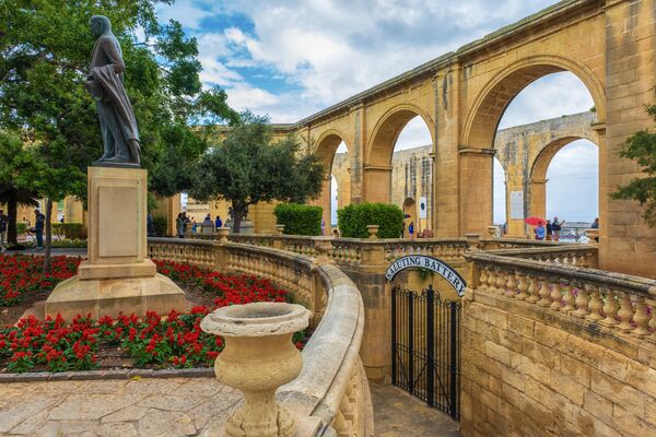 The Upper Barrakka Gardens are a public garden in Valletta, Malta. Along with the Lower Barrakka Gardens in the same city, they offer a panoramic view of the Grand Harbour. The gardens are located on the upper tier of Saints Peter and Paul Bastion. Lord Strickland Statue is located at the left of image. He was prime minister of Malta between 1924 - 1932...Valletta is an administrative unit and the capital of Malta which is an island country in Southern Europe, located in the Mediterranean Sea.