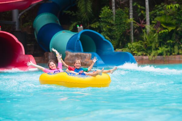 Kids in rubber ring at waterpark