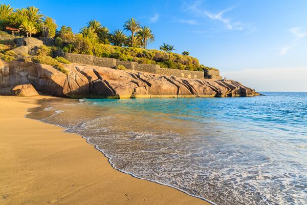 Ocean wave on tropical sandy El Duque beach in Costa Adeje, Tenerife, Canary Islands, Spain