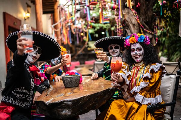 People dressed up to celebrate the day of the dead.