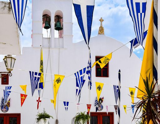 Flag bunting in the streets of Mykonos